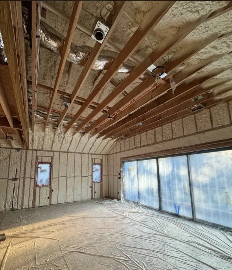 Interior walls and ceiling insulated with spray foam during new construction in New Freedom
